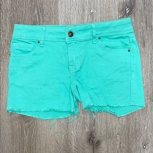 Green jean shorts